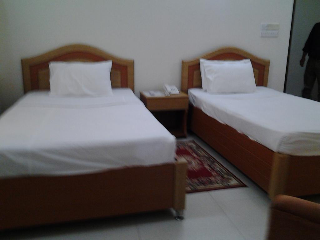 Hotel Afford Inn داكا الغرفة الصورة